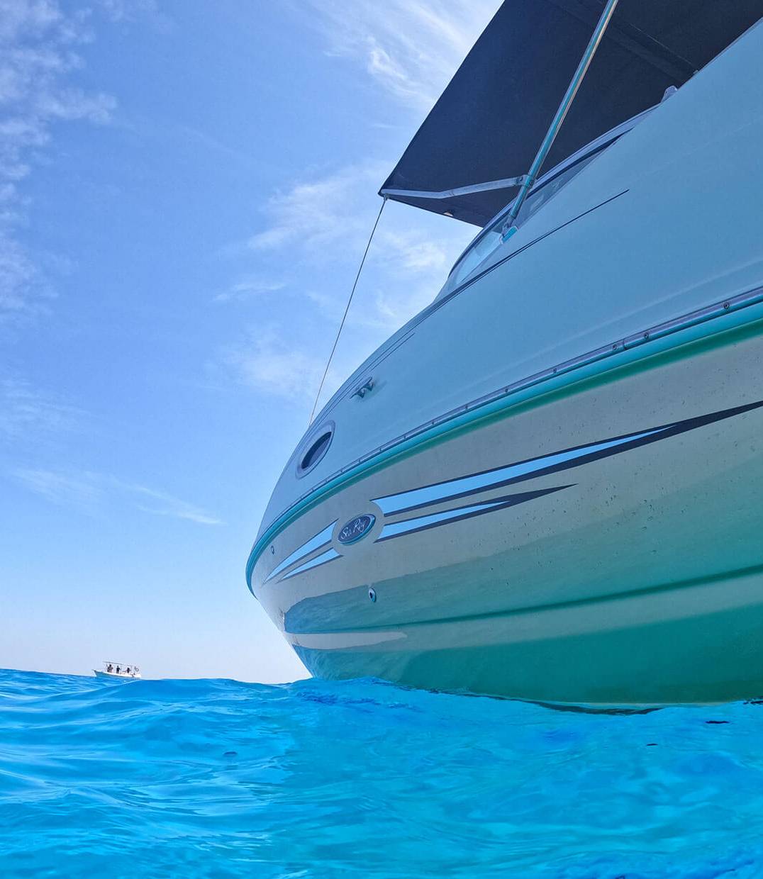 Private Sea Ray Sundeck 260 boat trip anchored at Lindos Bay